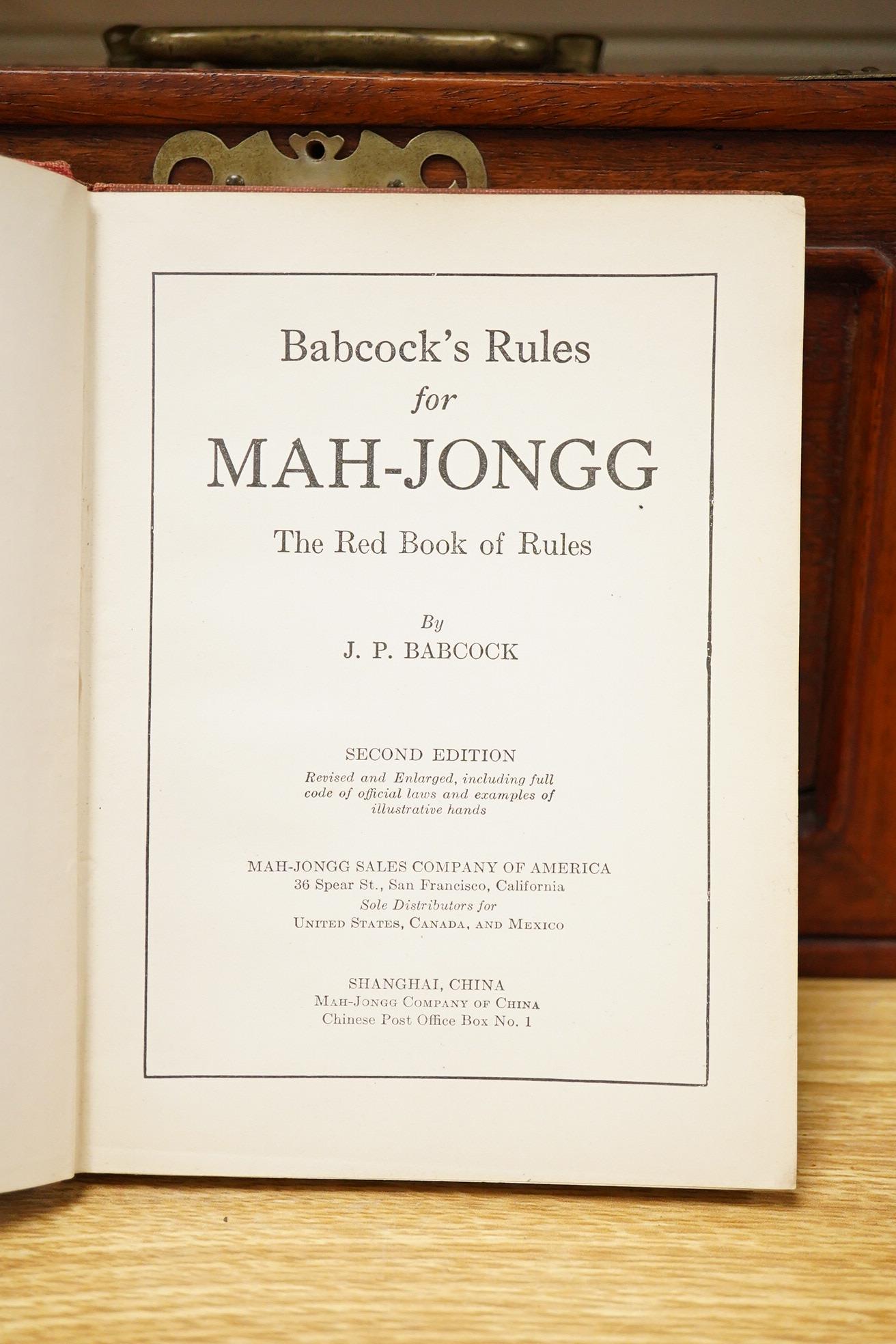 A Mah jong set an related book 24cm x 16.5cm high